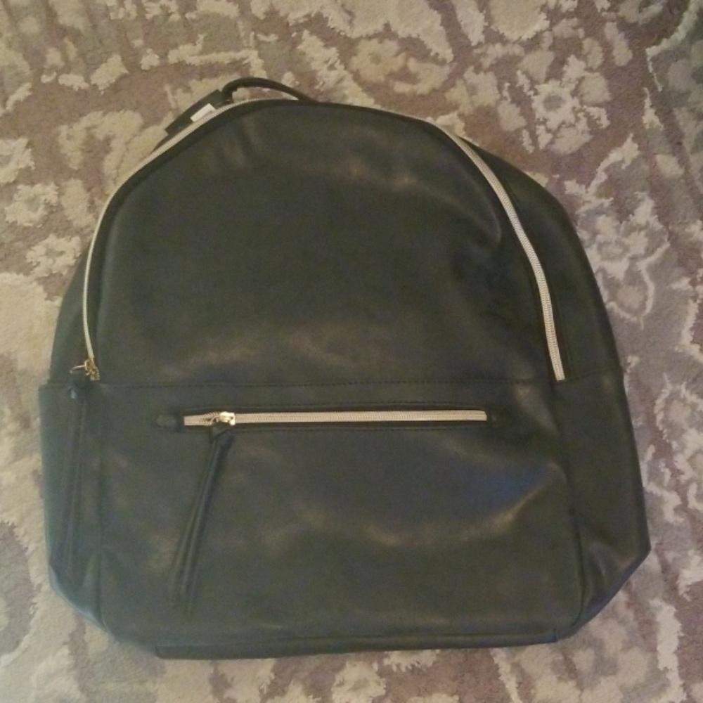 NWT leather and rose gold backpack